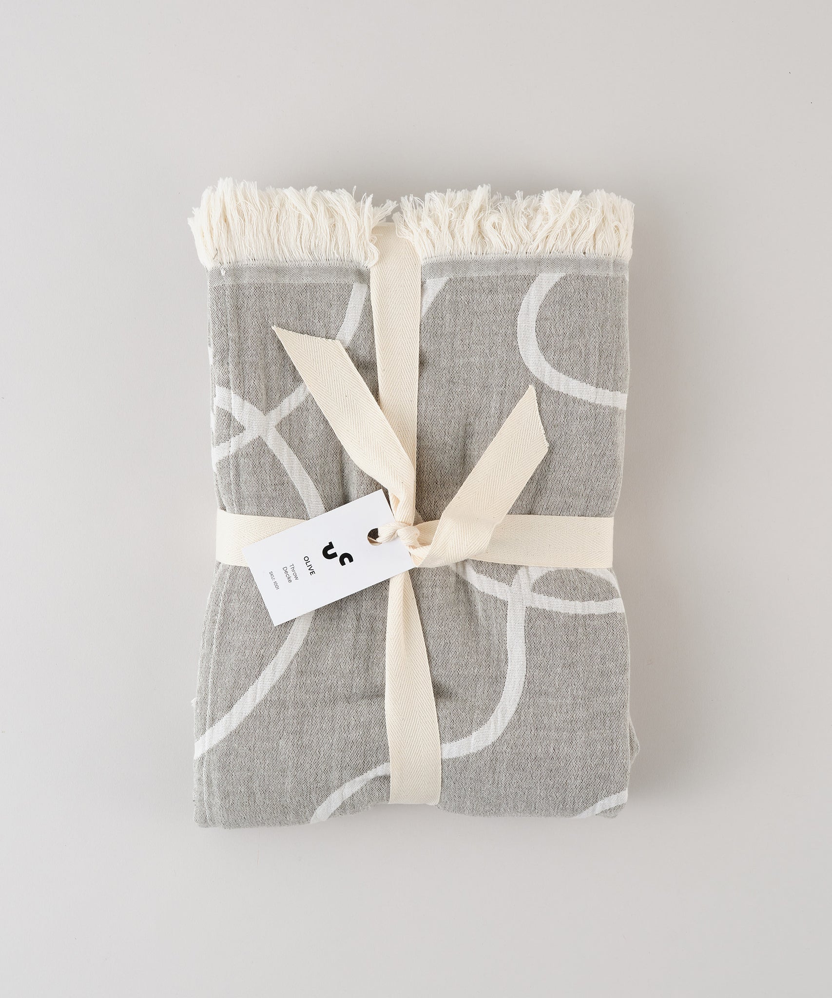Patterned recycled cotton throw blanket packaging